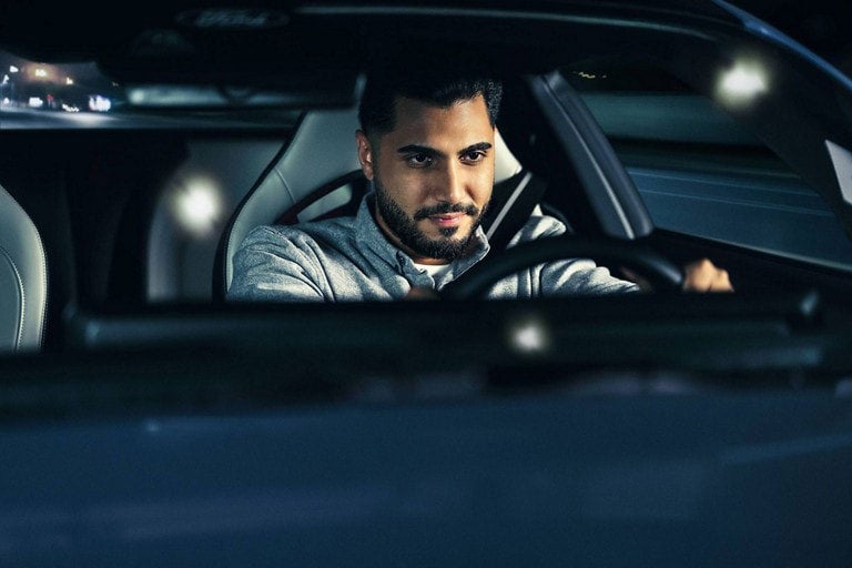 Person sitting in the driver’s seat of a parked 2024 Ford Mustang® coupe | Gates Ford Lincoln in Richmond KY