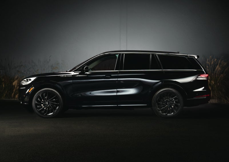 A 2024 Lincoln Aviator® SUV is shown in the Infinite Black exterior color | Gates Ford Lincoln in Richmond KY