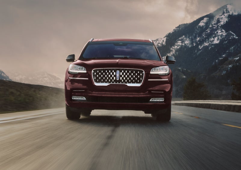A 2024 Lincoln Aviator® SUV is shown in the Diamond Red exterior color. | Gates Ford Lincoln in Richmond KY