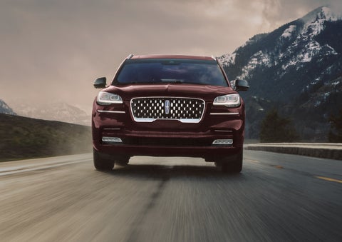 A 2024 Lincoln Aviator® SUV is shown in the Diamond Red exterior color. | Gates Ford Lincoln in Richmond KY