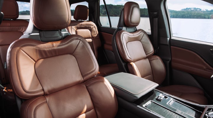 The front row's Perfect Position Seats in a 2024 Lincoln Aviator® Reserve model with Ebony Roast interior | Gates Ford Lincoln in Richmond KY
