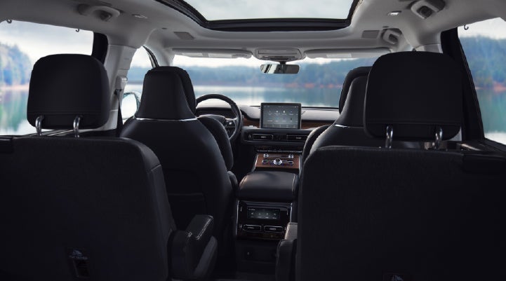 The interior of a 2024 Lincoln Aviator® SUV from behind the second row | Gates Ford Lincoln in Richmond KY