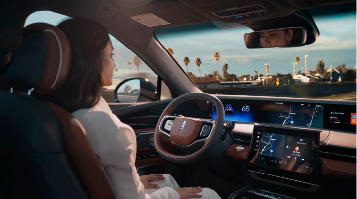 A person is shown driving hands-free on the highway with available Lincoln BlueCruise technology. | Gates Ford Lincoln in Richmond KY