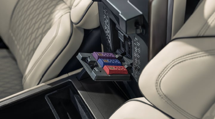 Digital Scent cartridges are shown in the diffuser located in the center arm rest. | Gates Ford Lincoln in Richmond KY