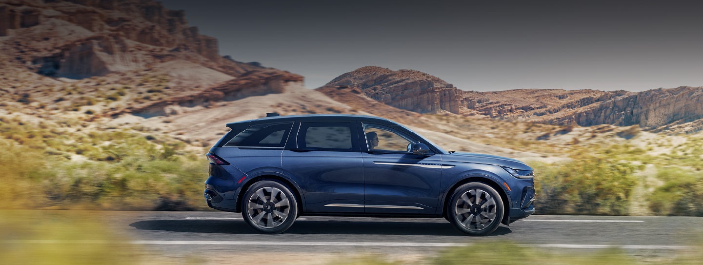 A 2024 Lincoln Nautilus® SUV is being driven in a desert setting. | Gates Ford Lincoln in Richmond KY