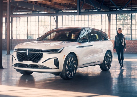 A person approaches a 2024 Lincoln Nautilus® SUV. | Gates Ford Lincoln in Richmond KY