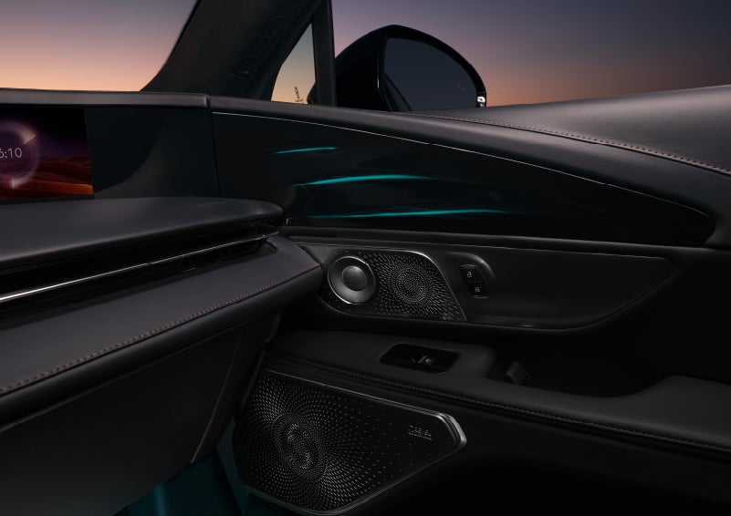 Selectable ambient lighting glows in the passenger door panel. | Gates Ford Lincoln in Richmond KY