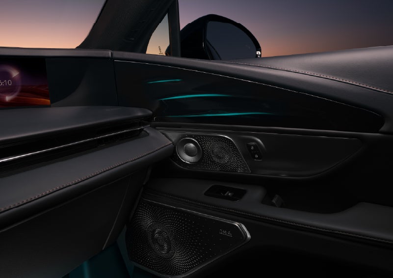 Selectable ambient lighting glows in the passenger door panel. | Gates Ford Lincoln in Richmond KY