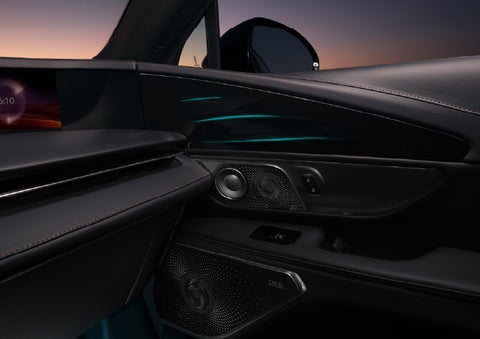 Selectable ambient lighting glows in the passenger door panel. | Gates Ford Lincoln in Richmond KY